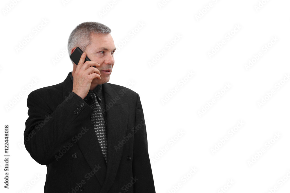 Middle age man in business black suit calls by mobile phone isolated on white background with copy space on right Middle age man in business black suit calls by mobile phone isolated on white background with copy space on right