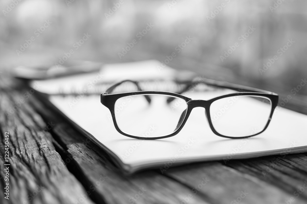  Goggles worn placed the book home record in black and white, white.