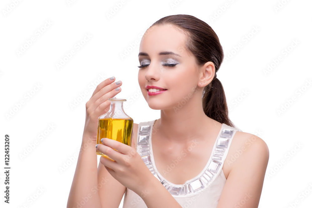 Woman with bottle of perfume isolated on white Woman with bottle of perfume isolated on white