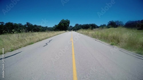 In the middle of the road driving POV.