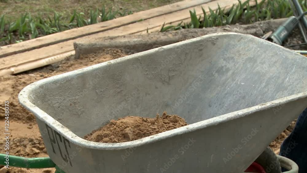 Manual wheelbarrow with concrete Manual wheelbarrow with concrete