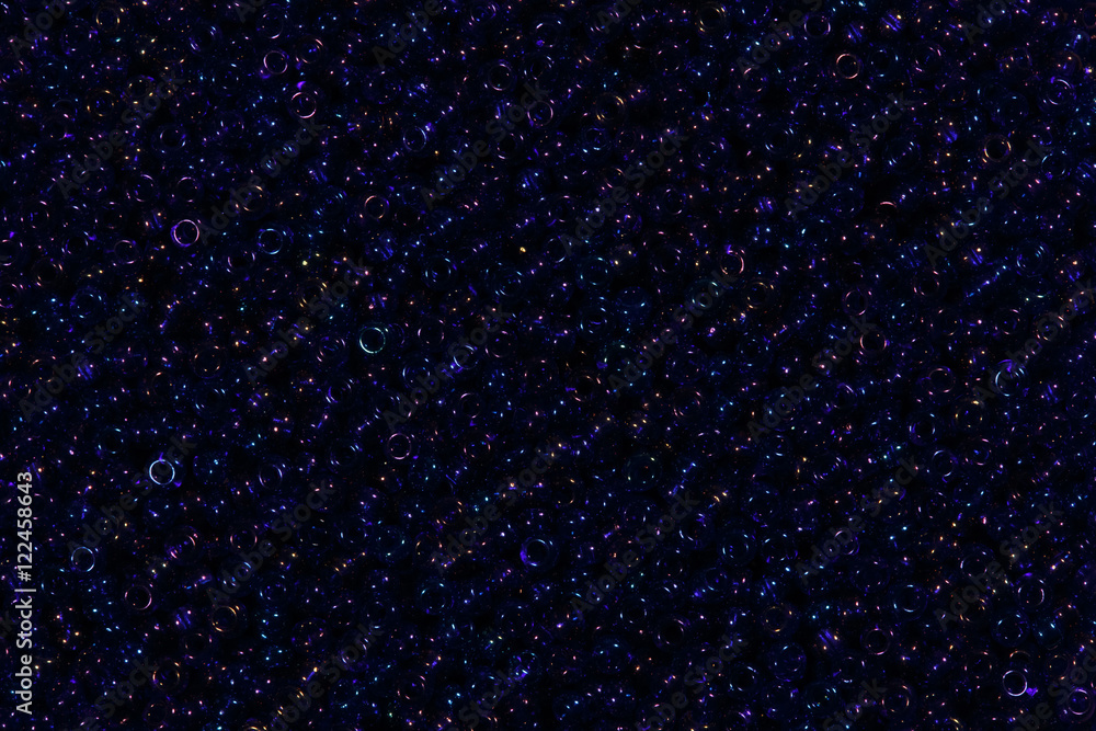 Obraz premium Dark blue beads. Macro photo.