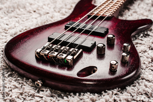 Rosewood bass electric guitar closeup photo