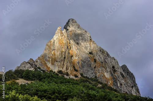 Picturesque rocks around the village of Sun Valley./ Russia, peninsula of Crimea, village of Sun Valley. Picturesque rocks around the village on a background of the autumn sky.