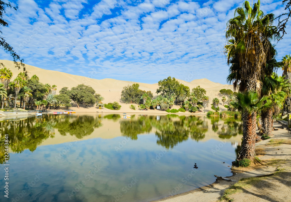 Oasis- Huacachina, a village in southwestern Peru, built around a small oasis surrounded by sand dunes, Ica Region, Peru