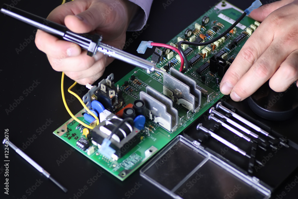 man hands chip soldering tools man hands chip soldering tools
