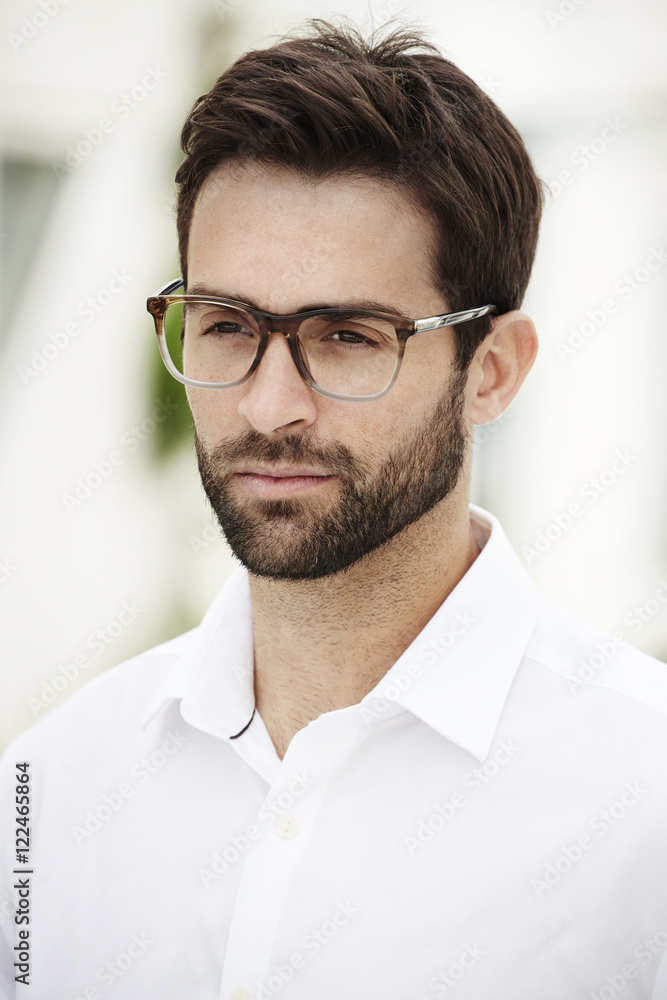 Serious man wearing spectacles Serious man wearing spectacles