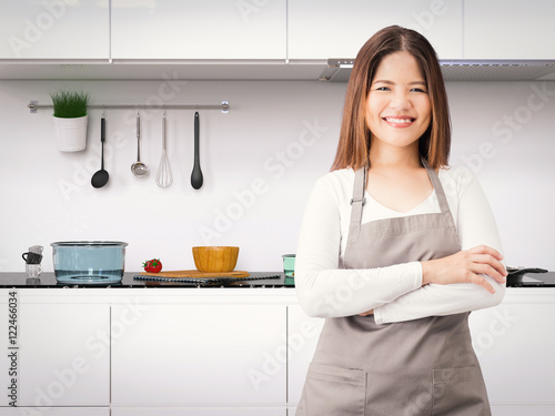 asian housekeeper with kitchen background