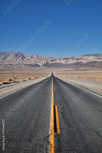 Long straight highway in the foothills of the Sierra Nevada Mountains