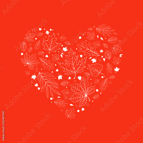 Autumn leaves heart design white outline on orange background