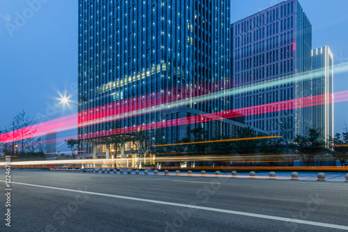 clean urban road with modern buildings at dusk,shanghai,china.