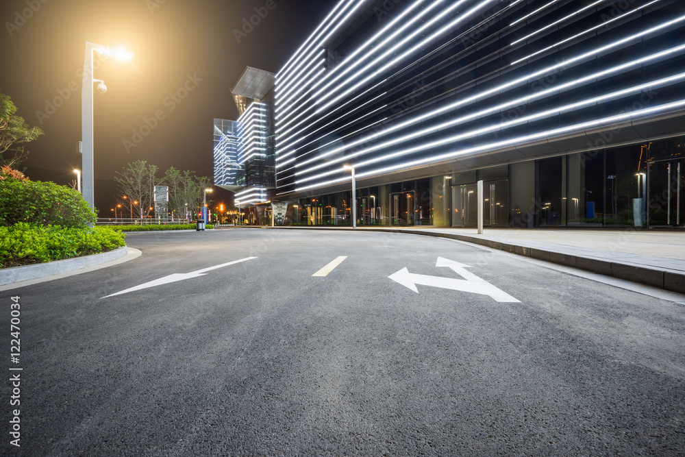 Fototapeta premium empty asphalt road nearby office building,china.