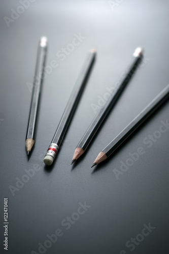 group of pencils on blackboard focus at pencil eraser, Concept s