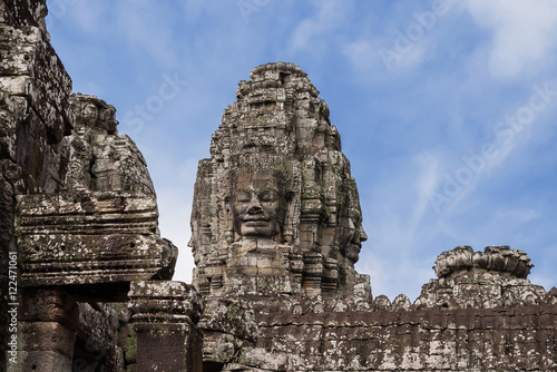 Towers with faces in Angkor Wat, temple complex in Cambodia and the largest religious monument in the world. UNESCO World Heritage Site.