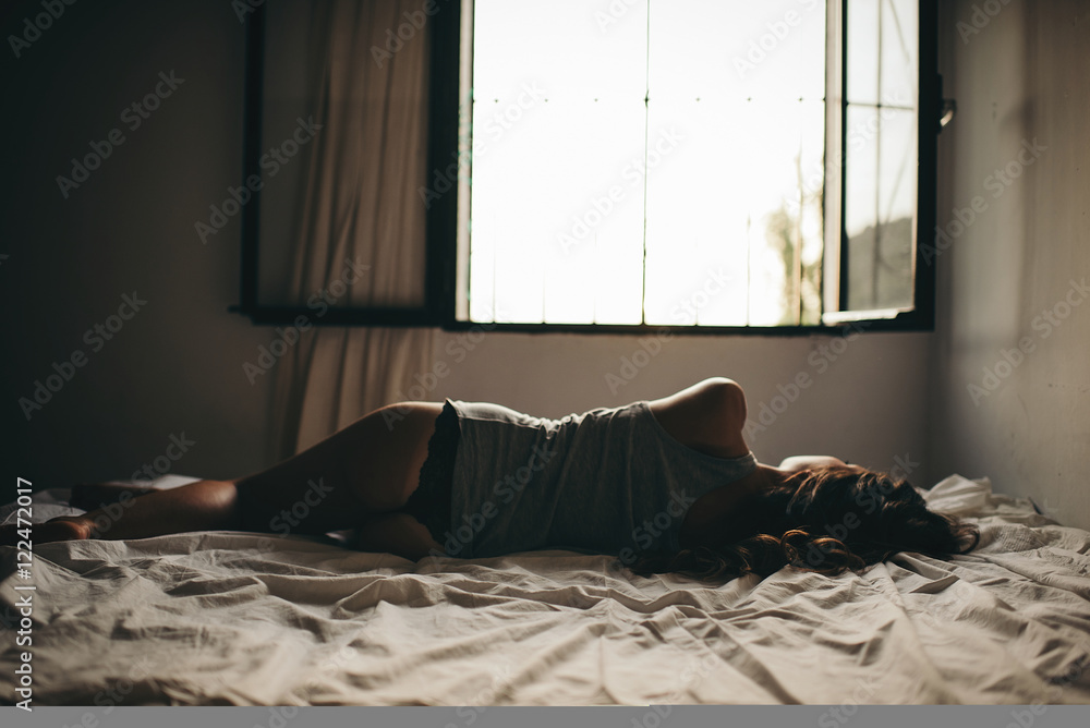 Unrecognizable woman with sexy butt lying on bed Stock Photo Adobe Stock