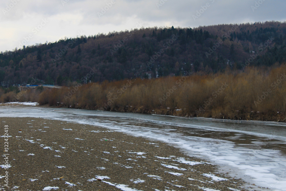 Winter river in Carpathian mountains