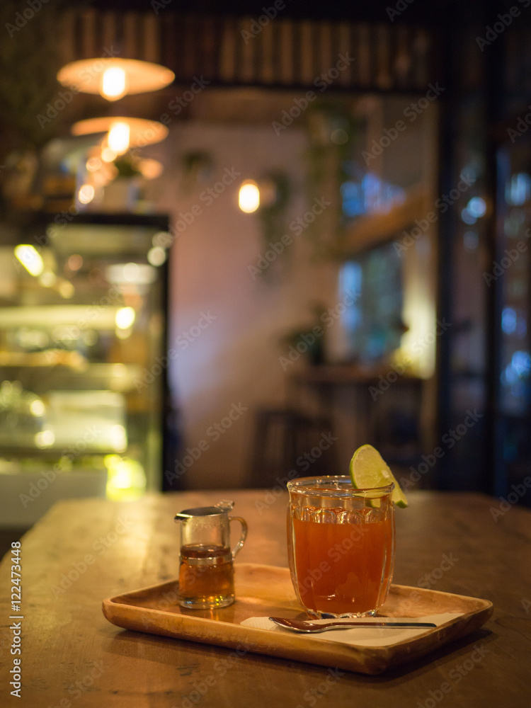 Honey leman tea on wooden table. Honey leman tea on wooden table.