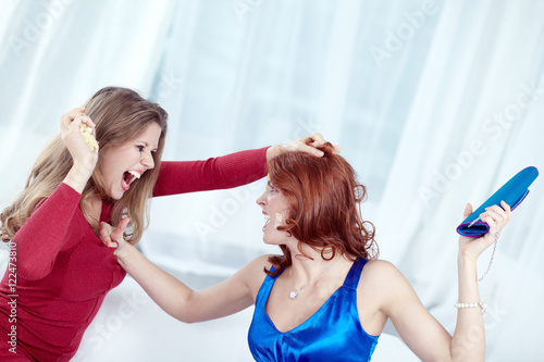 Two furious women having a quarrel