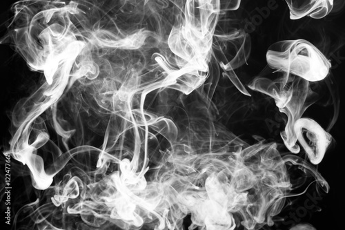 Abstract background. Movement of smoke with background is dark.