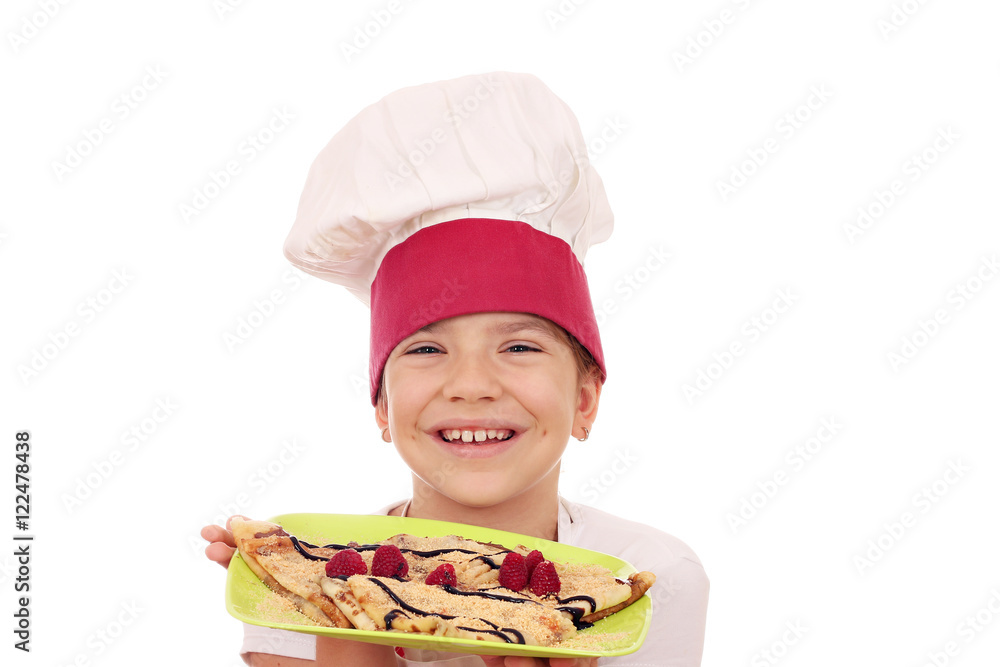 happy little girl cook with crepes on plate happy little girl cook with crepes on plate