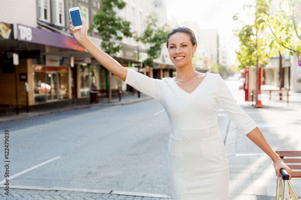 Business woman pulling suitcase bag walking in city Business woman pulling suitcase bag walking in city