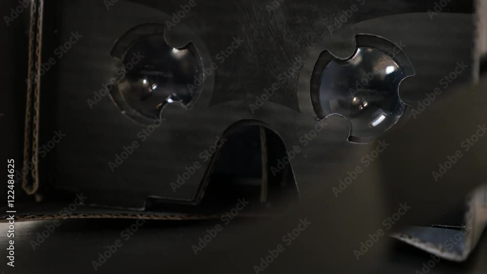 Action going on mobile phone in VR equipment 4K 2160p 30fps UHD footage - Virtual reality carton made glasses on the wooden table slow tilt 3840X2160 UltraHD video Action going on mobile phone in VR equipment 4K 2160p 30fps UHD footage - Virtual reality carton made glasses on the wooden table slow tilt 3840X2160 UltraHD video