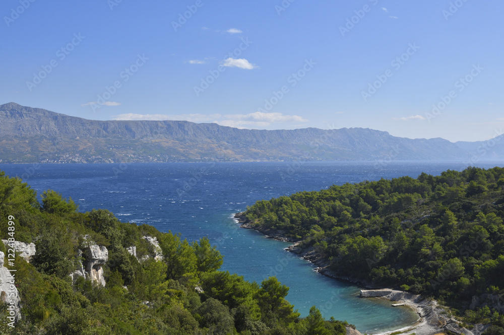 Nice beach with blue water and a blue sky, picture from Island Brac in Croatia. Nice beach with blue water and a blue sky, picture from Island Brac in Croatia.