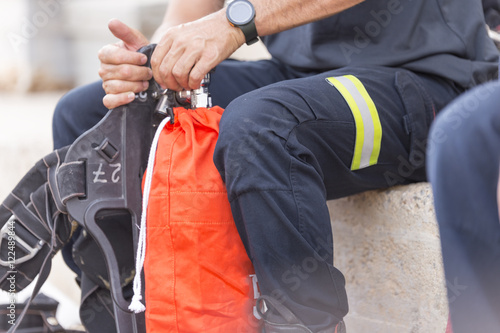 Firefighter reviewing material