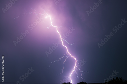 Summer storm with thunder, lightnings and rain.