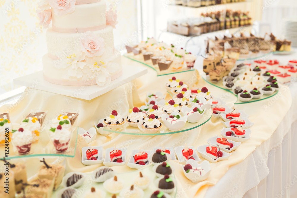 Delicious wedding reception candy bar dessert table Delicious wedding reception candy bar dessert table