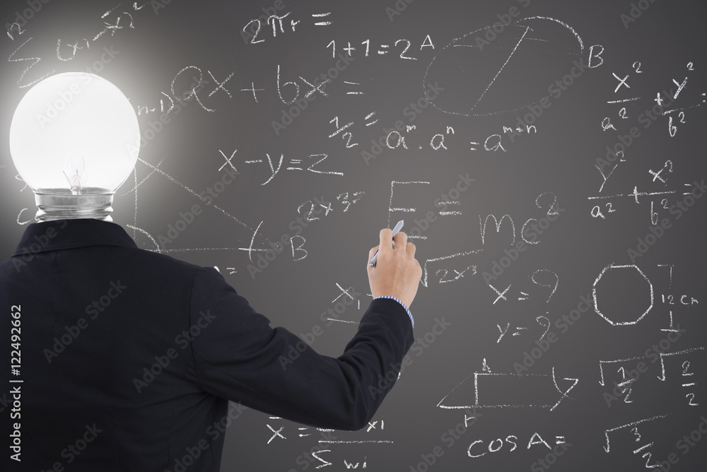 businessman with lighbulb in head standing and hand drawing inspiration or idea, brainstorming on blackboard background. businessman with lighbulb in head standing and hand drawing inspiration or idea, brainstorming on blackboard background.