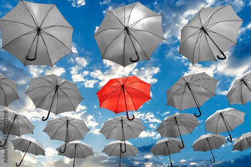 umbrella standing out from the crowd unique concept 