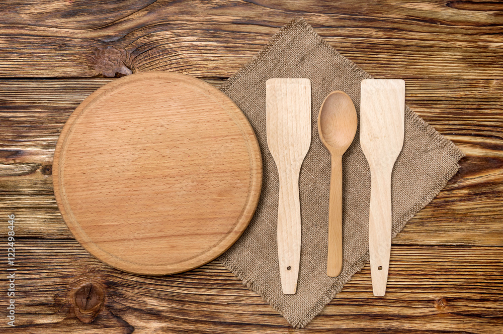 Wooden utensils on a wooden background Wooden utensils on a wooden background