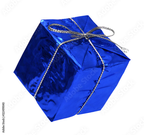 Blue gift with a silver ribbon and a bow falling on white backgr