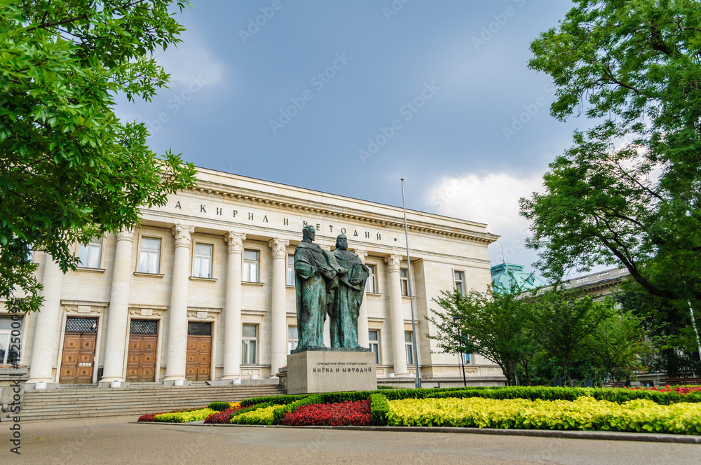 National library in Sofia, Bulgaria - beautiful old building with the monument of the founders of Cyrillic alphabet in front