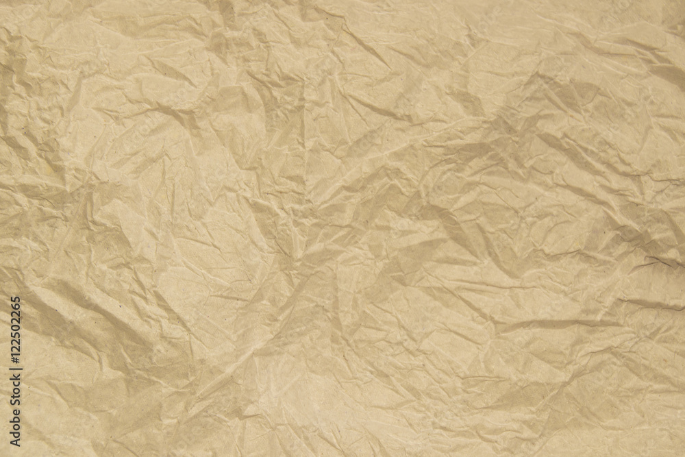 Obraz premium Old soft brown crumpled paper abstract texture background