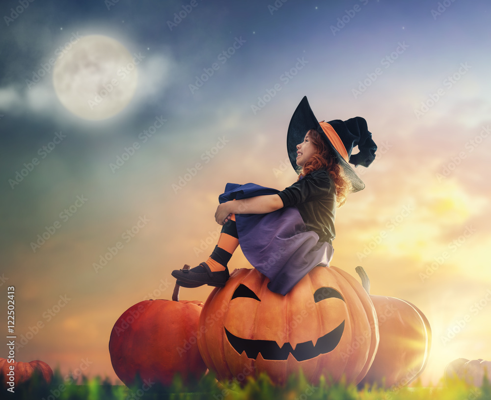 Fototapeta premium little witch outdoors