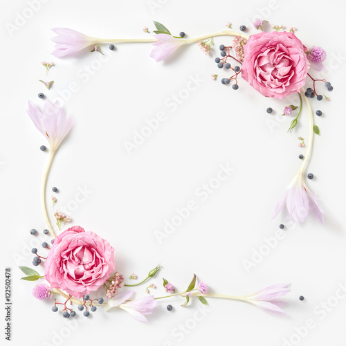 Fresh pink roses frame border isolated