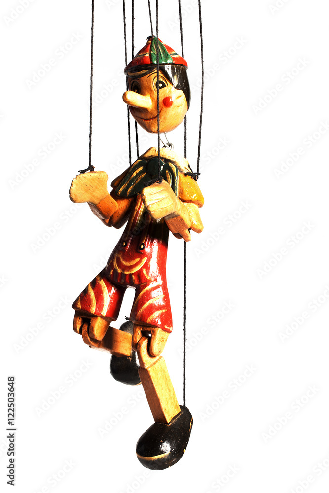 Pinocchio liar doll with big nose isolated on background