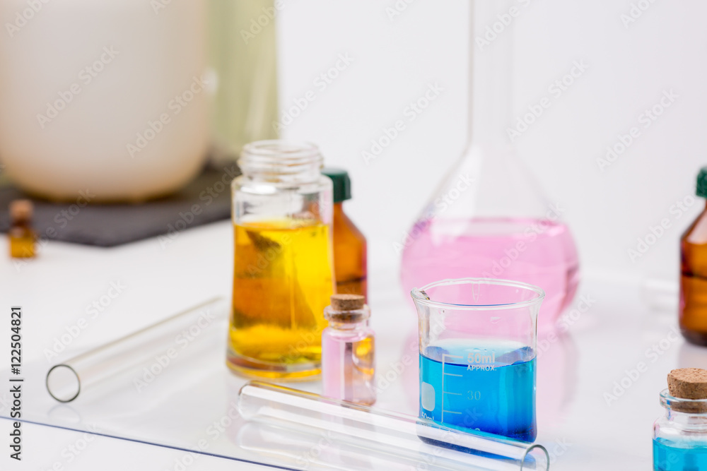 Pharmacy and chemistry theme. Test glass flask with solution in Pharmacy and chemistry theme. Test glass flask with solution in