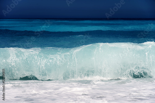 Beautiful Blue Sea Wave spalshing, dramatic sea in gradient blue tones