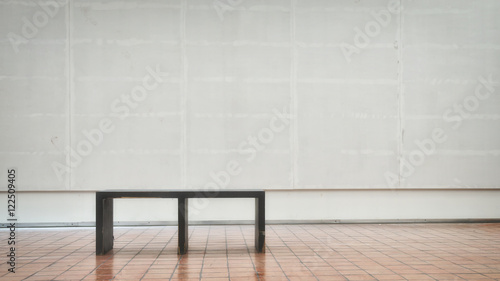 White room under construction with bench, empty room concept © smshoot