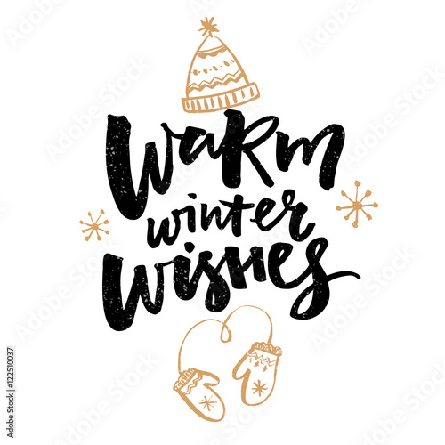 Warm winter wishes text. Greeting card with brush calligraphy and hand drawn illustrations of mittens and hat