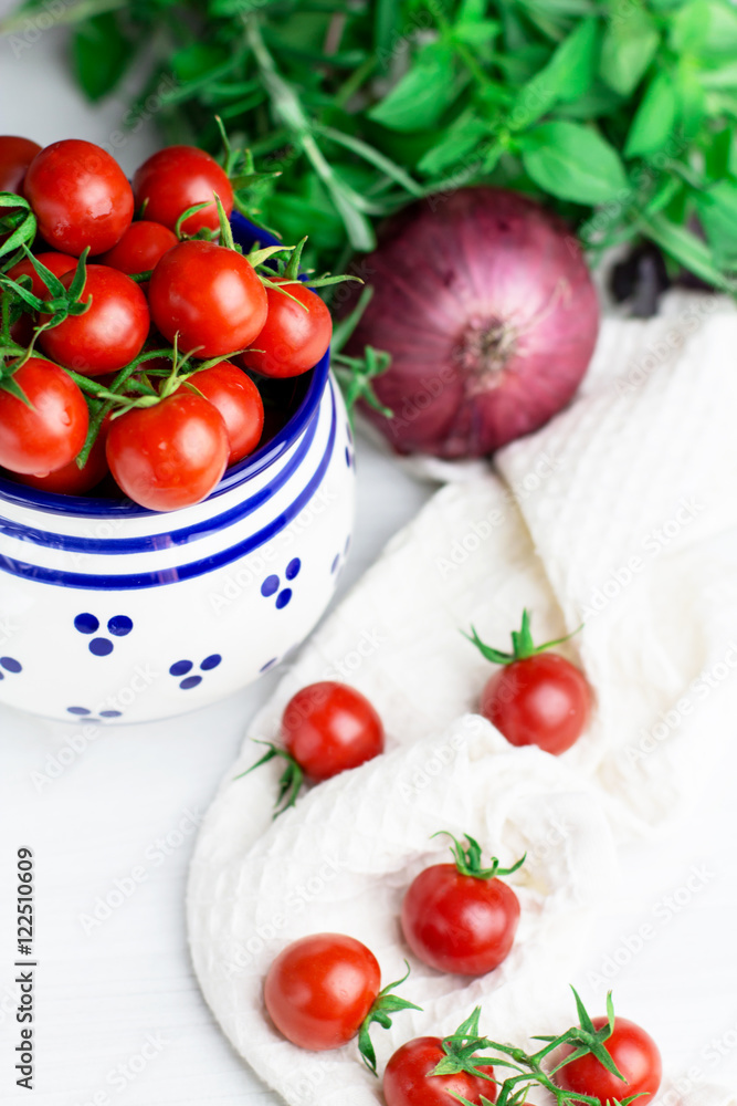 Cherry tomatoes in a barrel, selective focus, top view, vertical Cherry tomatoes in a barrel, selective focus, top view, vertical