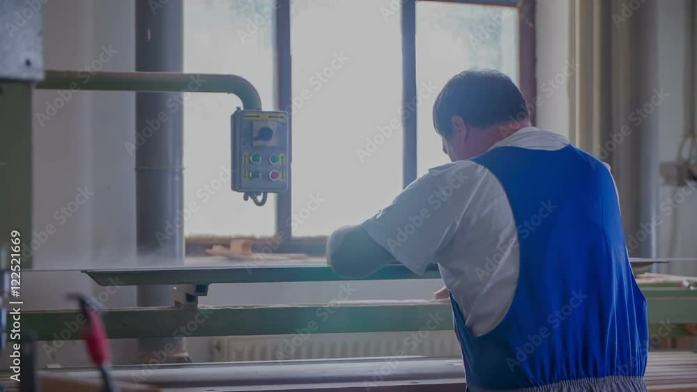 A joiner is touching a piece of wood a few times and turning it around. Then he starts chiseling it on a belt sander in his workshop at home.
A joiner is touching a piece of wood a few times and turning it around. Then he starts chiseling it on a belt sander in his workshop at home.