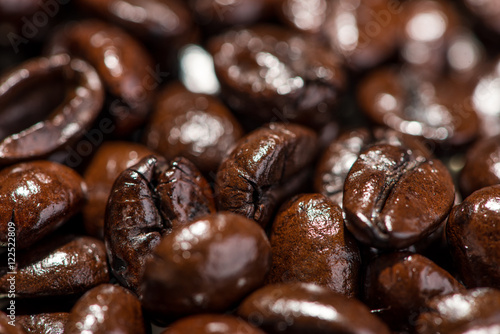 Coffee beans. Roasted coffee beans background. © makistock