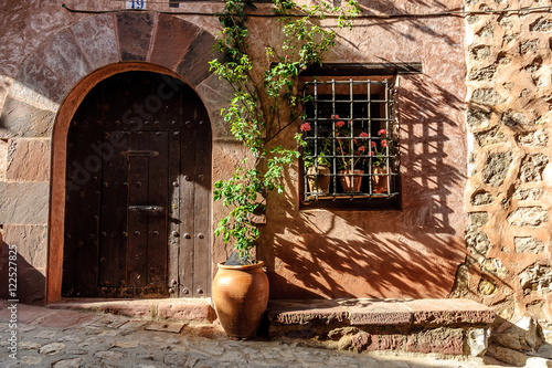 front of a house of the medieval town of Albarracin in Teruel, Aragon, Spain