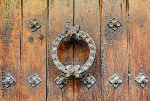 medieval iron door knocker in a door in the Albarracin town in the province of Teruel, Aragon, Spain
