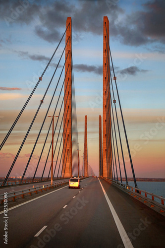 View on Oresund bridge between Sweden and Denmark at sunset