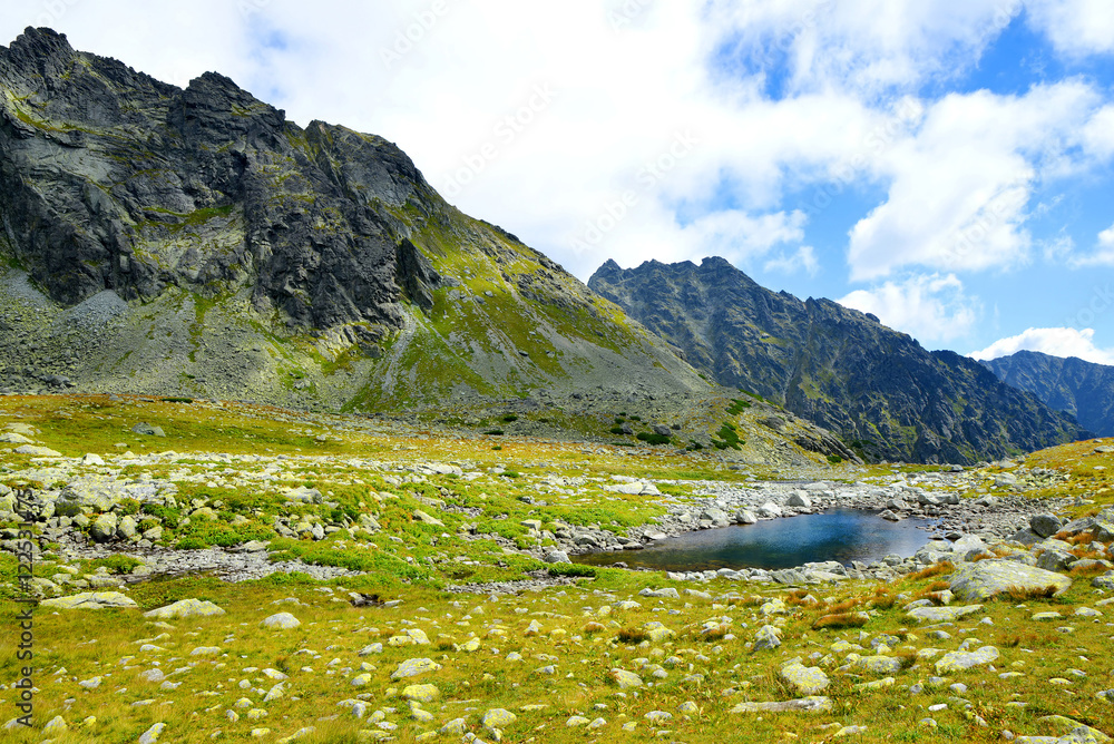 Mountain landscape in the Western Carpathians. Small lake in Mengusovska Valley, Vysoke Tatry (High Tatras), Slovakia